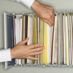 Businessman Filing Information